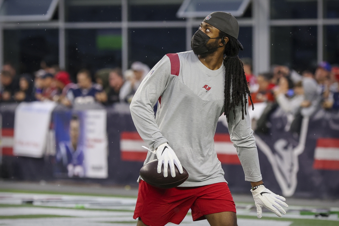 Oct 3, 2021; Foxboro, MA, USA; Tampa Bay Buccaneers cornerback Richard Sherman warms up before the game against the New England Patriots at Gillette Stadium.  Mandatory Credit: Paul Rutherford-USA TODAY Sports