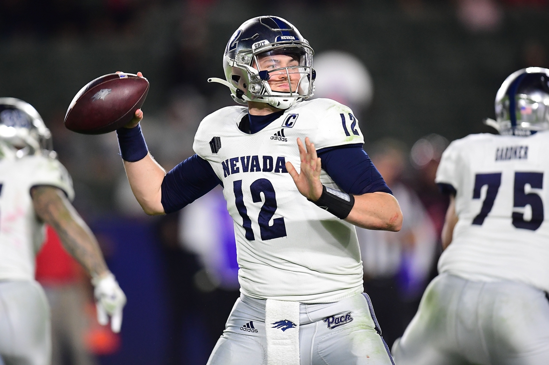 Nov 13, 2021; Carson, California, USA; Nevada Wolf Pack quarterback Carson Strong (12) throws against the San Diego State Aztecs during the second half at Dignity Health Sports Park. Mandatory Credit: Gary A. Vasquez-USA TODAY Sports