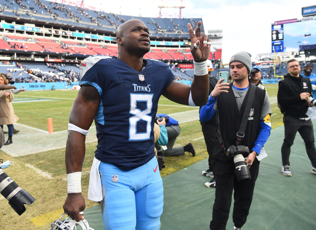 Nov 14, 2021; Nashville, Tennessee, USA; Tennessee Titans running back Adrian Peterson (8) leaves the field after a win against the New Orleans Saints at Nissan Stadium. Mandatory Credit: Christopher Hanewinckel-USA TODAY Sports