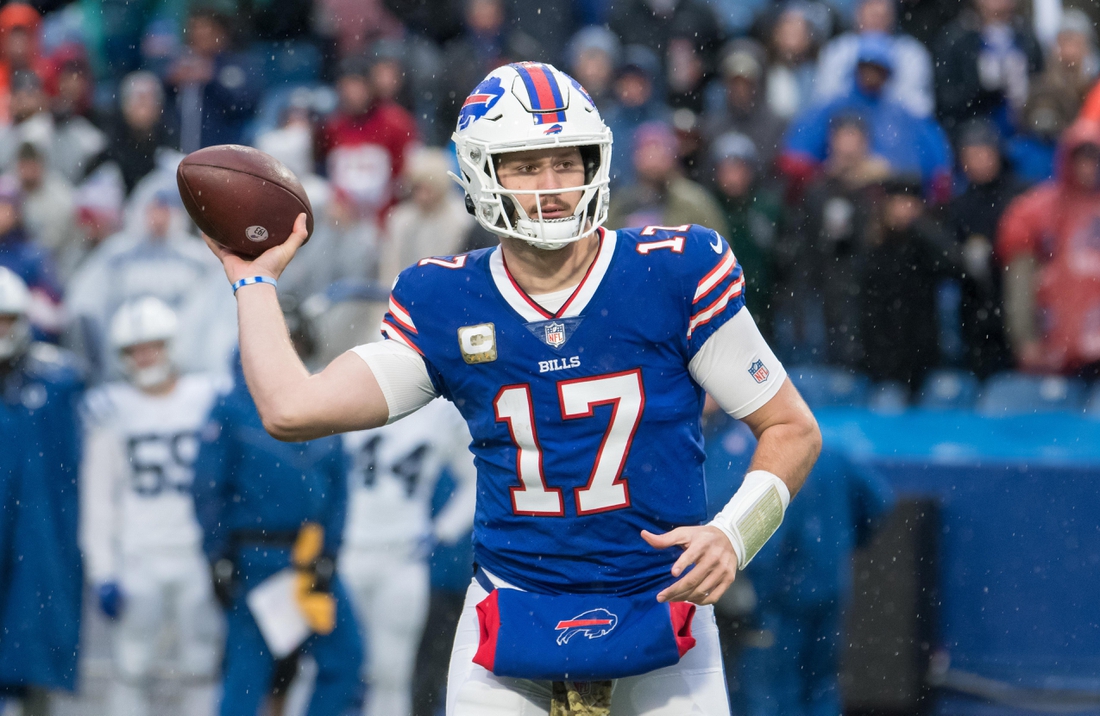 Nov 21, 2021; Orchard Park, New York, USA; Buffalo Bills quarterback Josh Allen (17) throws a pass in the fourth quarter against the Indianapolis Colts at Highmark Stadium. Mandatory Credit: Mark Konezny-USA TODAY Sports