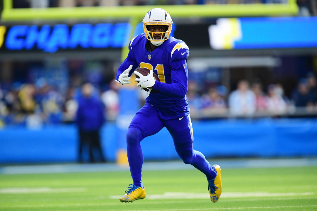 Dec 12, 2021; Inglewood, California, USA; Los Angeles Chargers wide receiver Mike Williams (81) runs the ball against the New York Giants during the first half at SoFi Stadium. Mandatory Credit: Gary A. Vasquez-USA TODAY Sports