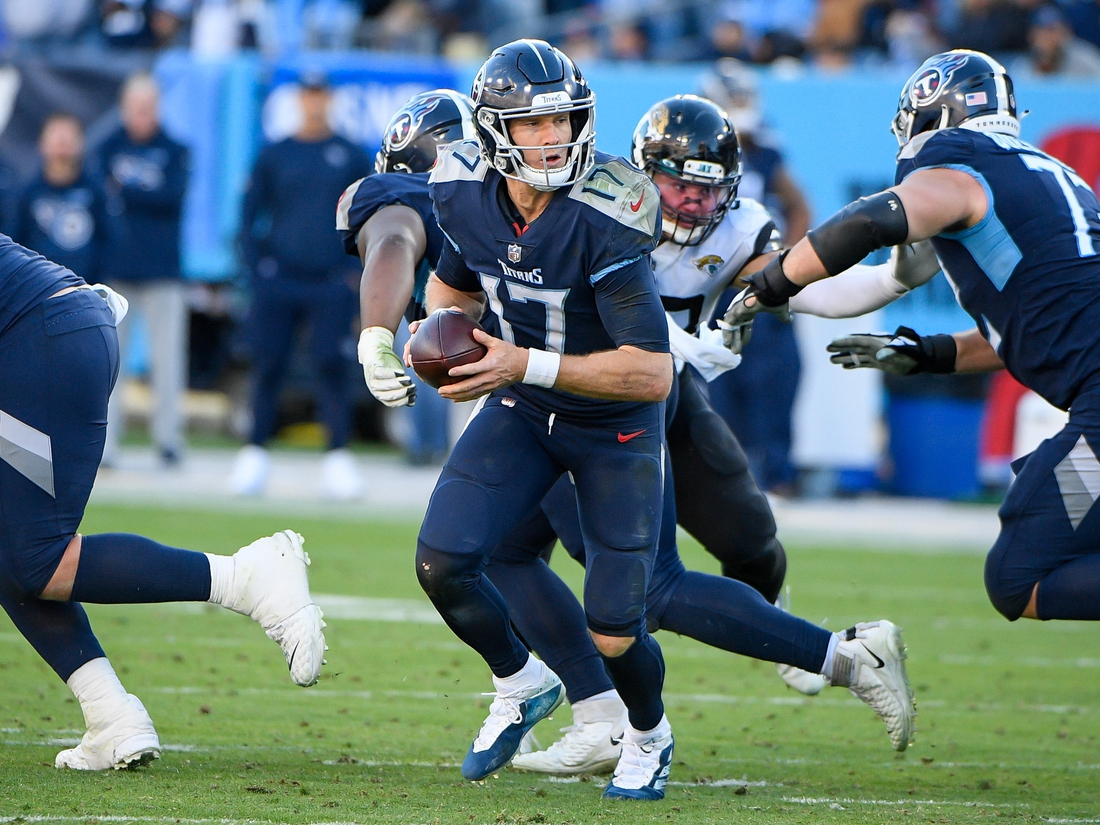 Dec 12, 2021; Nashville, Tennessee, USA;  Tennessee Titans quarterback Ryan Tannehill (17) hands the ball off against the Jacksonville Jaguars during the second half at Nissan Stadium. Mandatory Credit: Steve Roberts-USA TODAY Sports