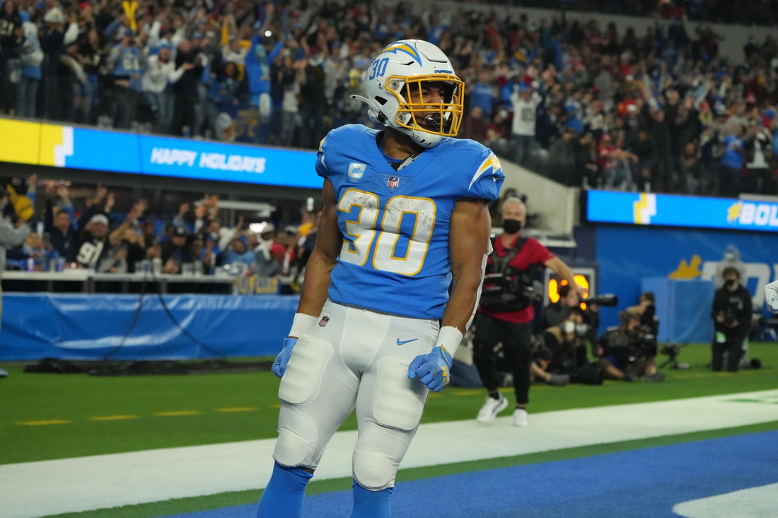 Dec 16, 2021; Inglewood, California, USA; Los Angeles Chargers running back Austin Ekeler (30) celebrates after a touchdown against the Kansas City Chiefs in the second half at SoFi Stadium. Mandatory Credit: Kirby Lee-USA TODAY Sports