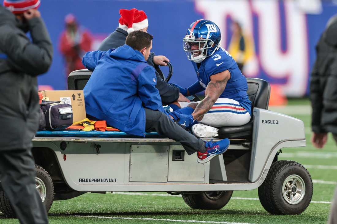 Dec 19, 2021; East Rutherford, New Jersey, USA; New York Giants wide receiver Sterling Shepard (3) is driven off of the field after an injury during the second half against the Dallas Cowboys at MetLife Stadium. Mandatory Credit: Vincent Carchietta-USA TODAY Sports