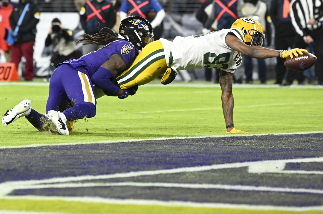 Dec 19, 2021; Baltimore, Maryland, USA;  Green Bay Packers wide receiver Marquez Valdes-Scantling (83)] divers for a touchdown  during the second half HG at M&T Bank Stadium. Mandatory Credit: Tommy Gilligan-USA TODAY Sports
