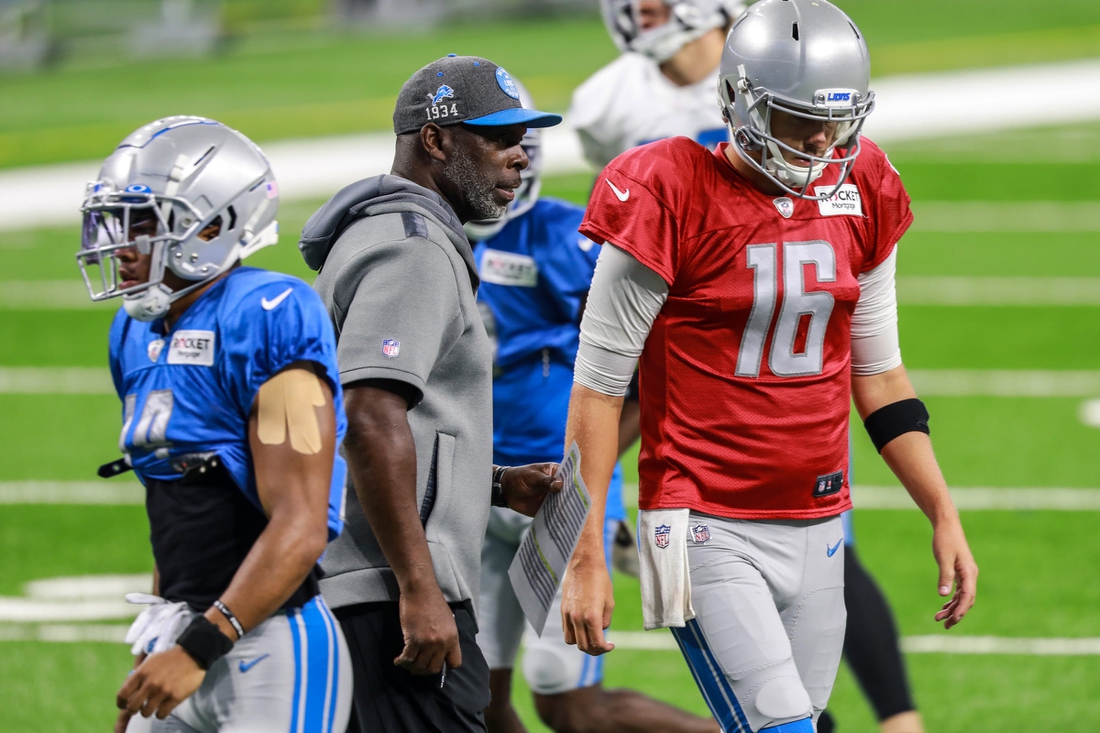 Lions offensive coordinator Anthony Lynn talks with QB Jared Goff during a team practice at Ford Field on Saturday, Aug. 7, 2021.

Fordfieldpractice 080721 Kp2