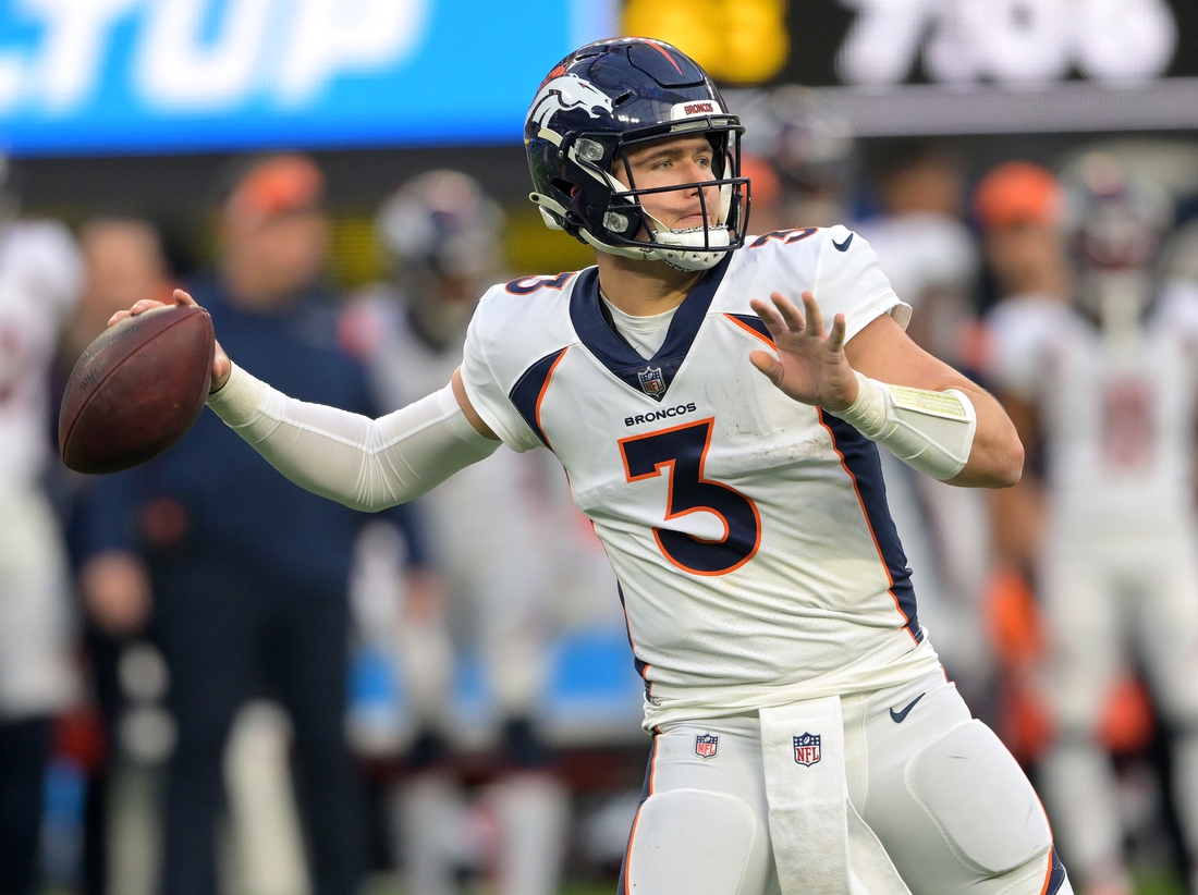 Jan 2, 2022; Inglewood, California, USA; Denver Broncos quarterback Drew Lock (3) sets to pass in the second half the game against the Los Angeles Chargers at SoFi Stadium. Mandatory Credit: Jayne Kamin-Oncea-USA TODAY Sports