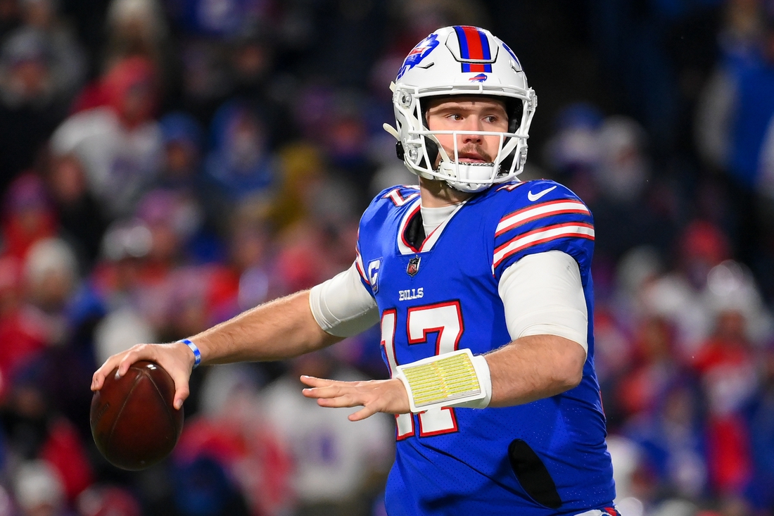 Jan 9, 2022; Orchard Park, New York, USA; Buffalo Bills quarterback Josh Allen (17) drops back to pass against the New York Jets during the second half at Highmark Stadium. Mandatory Credit: Rich Barnes-USA TODAY Sports