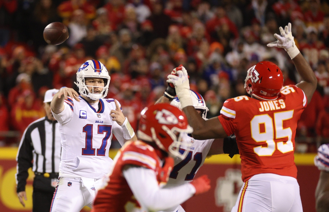 Bills quarterback Josh Allen throws over Chiefs Chris Jones.