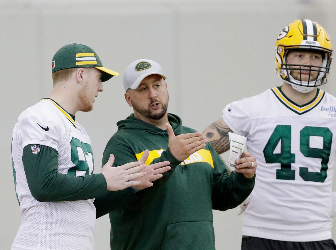 Green Bay Packers tight ends coach Justin Outten works with tight ends Jace Sternberger (87) and Evan Baylis (49) during practice at rookie minicamp at the Don Hutson Center on Friday, May 3, 2019 in Ashwaubenon, Wis.

Gpg Packers Rookie Camp 050319 Abw413