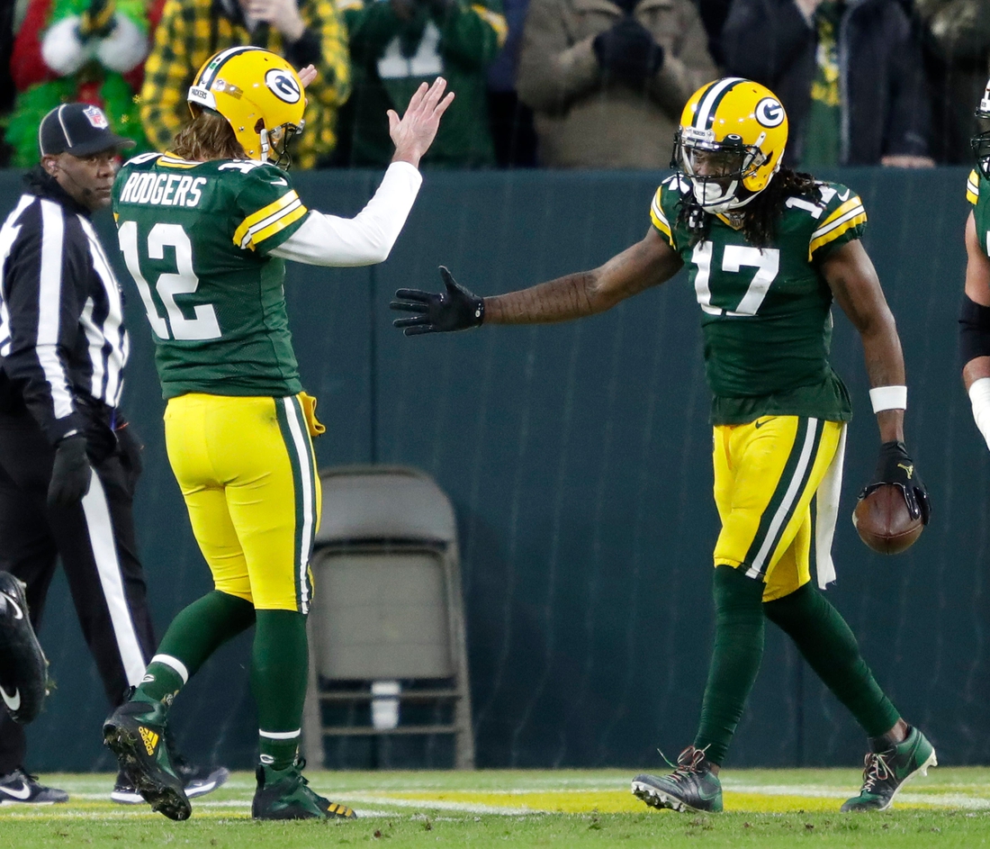 Green Bay Packers quarterback Aaron Rodgers (12) celebrates with wide receiver Davante Adams (17) after scoring a touchdown in the second quarter during their football game Saturday, December 25, 2021, at Lambeau Field in Green Bay, Wis. The touchdown Adams ahead of Jordy Nelsons for touchdown receptions from Rodgers.Dan Powers/USA TODAY NETWORK-Wisconsin

Apc Packvsbrowns 1225211374djp