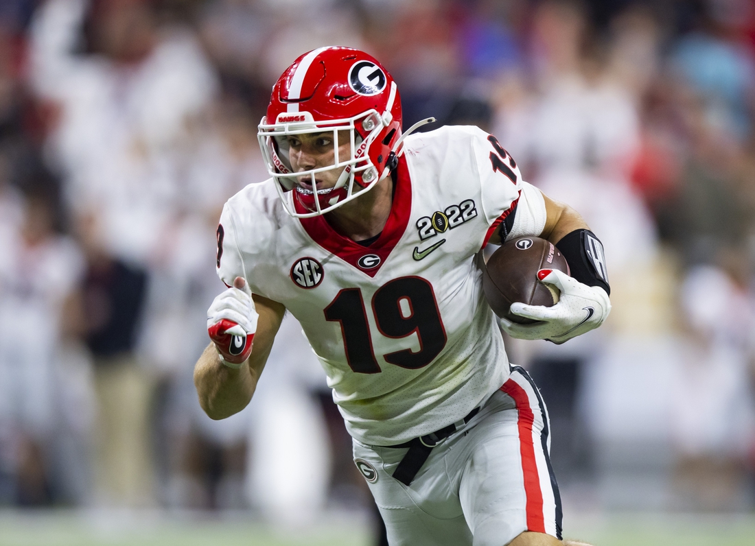 Jan 10, 2022; Indianapolis, IN, USA; Georgia Bulldogs tight end Brock Bowers (19) against the Alabama Crimson Tide in the 2022 CFP college football national championship game at Lucas Oil Stadium. Mandatory Credit: Mark J. Rebilas-USA TODAY Sports
