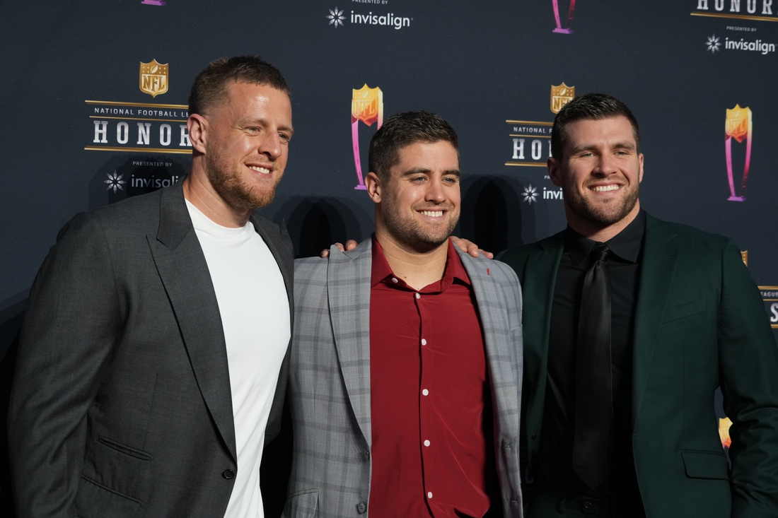 Feb 10, 2022; Los Angeles, CA, USA;  J.J. Watt (left) with his brothers Derek Watt and T.J. Watt (right) appears on the red carpet prior to the NFL Honors awards presentation at YouTube Theater. Mandatory Credit: Kirby Lee-USA TODAY Sports