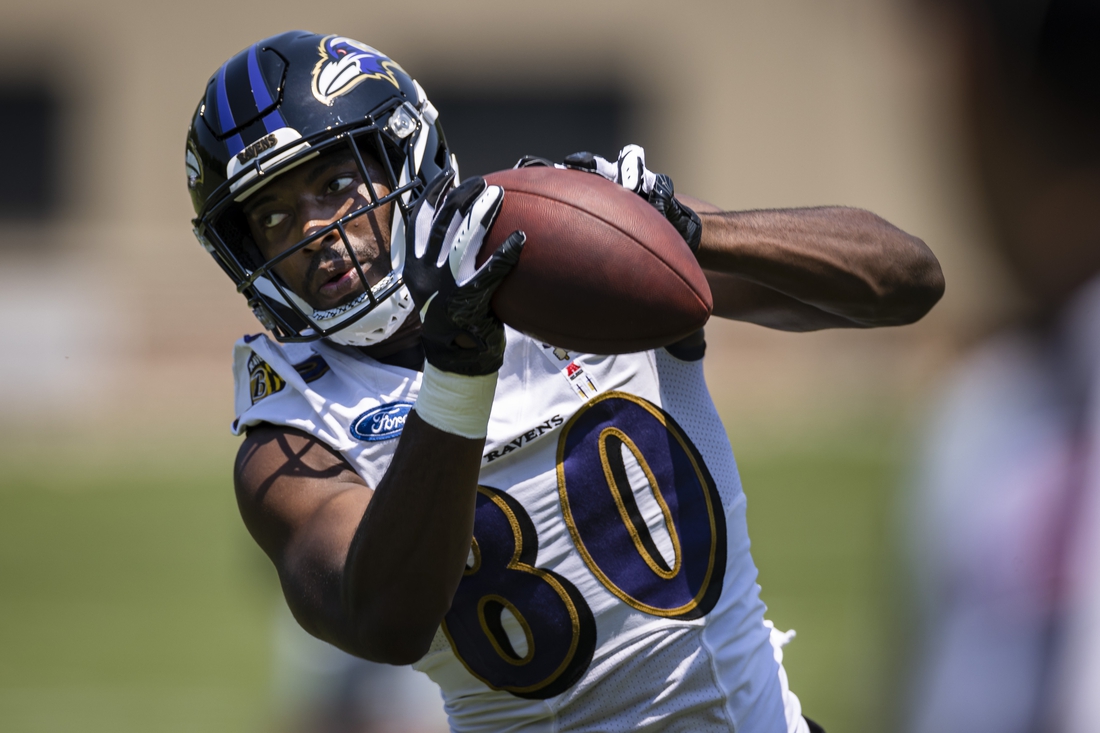 May 26, 2021; Owings Mills, Maryland, USA; Baltimore Ravens wide receiver Miles Boykin (80) catches a pass during an OTA at Under Armour Performance Center. Mandatory Credit: Scott Taetsch-USA TODAY Sports