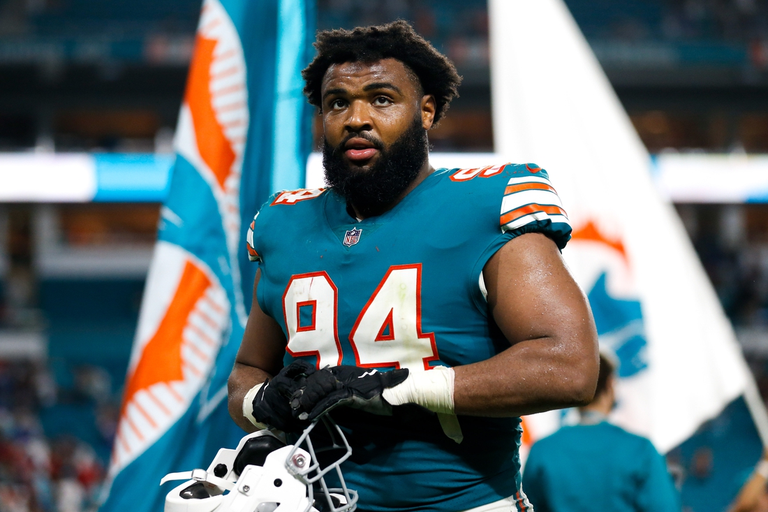 Jan 9, 2022; Miami Gardens, Florida, USA; Miami Dolphins defensive end Christian Wilkins (94) watches from the field after the game against the New England Patriots at Hard Rock Stadium. Mandatory Credit: Sam Navarro-USA TODAY Sports