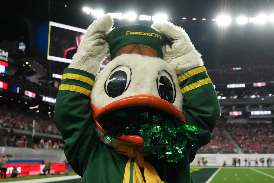 Dec 3, 2021; Las Vegas, NV, USA; Oregon Ducks mascot Puddles poses against the Utah Utes in the second half during the 2021 Pac-12 Championship Game at Allegiant Stadium.Utah defeated Oregon 38-10.  Mandatory Credit: Kirby Lee-USA TODAY Sports
