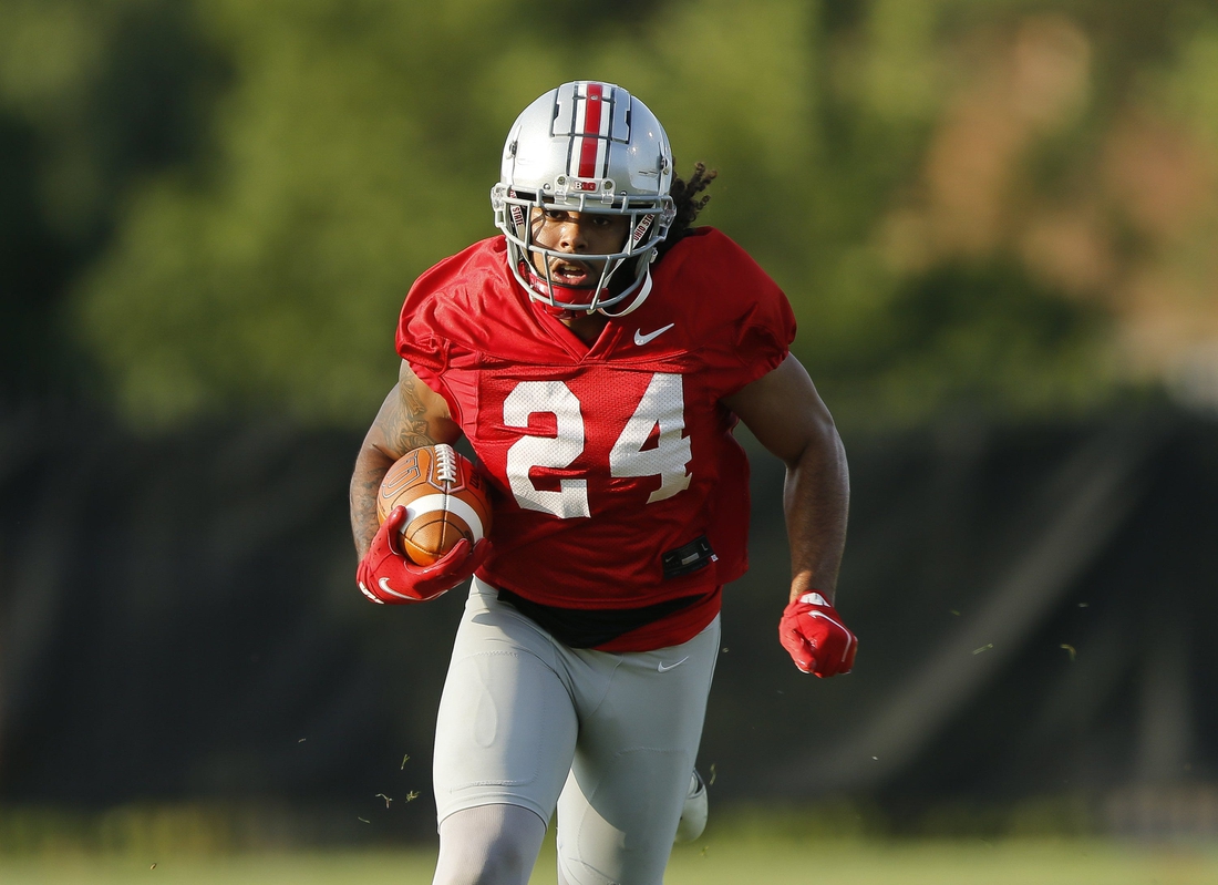 Ohio State Buckeyes running back Marcus Crowley (24) runs upfield during Ohio State's first football practice of fall camp at the Woody Hayes Athletic Center in Columbus on Wednesday, Aug. 4, 2021.

Ohio State Football First Practice