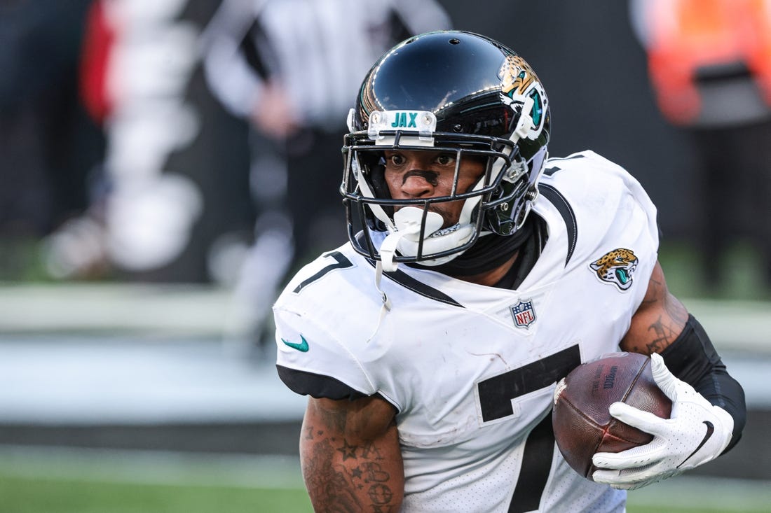 Dec 26, 2021; East Rutherford, New Jersey, USA; Jacksonville Jaguars wide receiver Tavon Austin (7) gains yards after a catch against the New York Jets during the first half at MetLife Stadium. Mandatory Credit: Vincent Carchietta-USA TODAY Sports