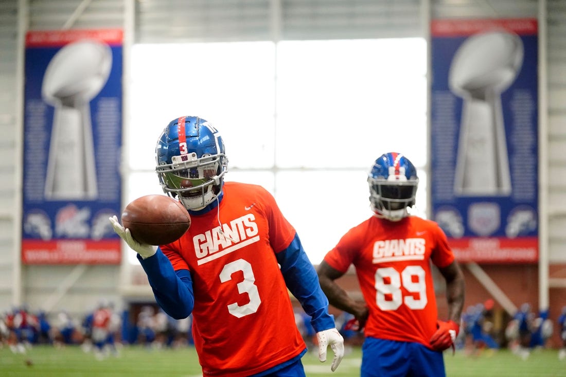 New York Giants wide receiver Sterling Shepard (3) makes one-handed catches as Kadarius Toney (89) looks on during organized team activities (OTAs) at the training center in East Rutherford on Thursday, May 19, 2022.

Nfl Ny Giants Practice