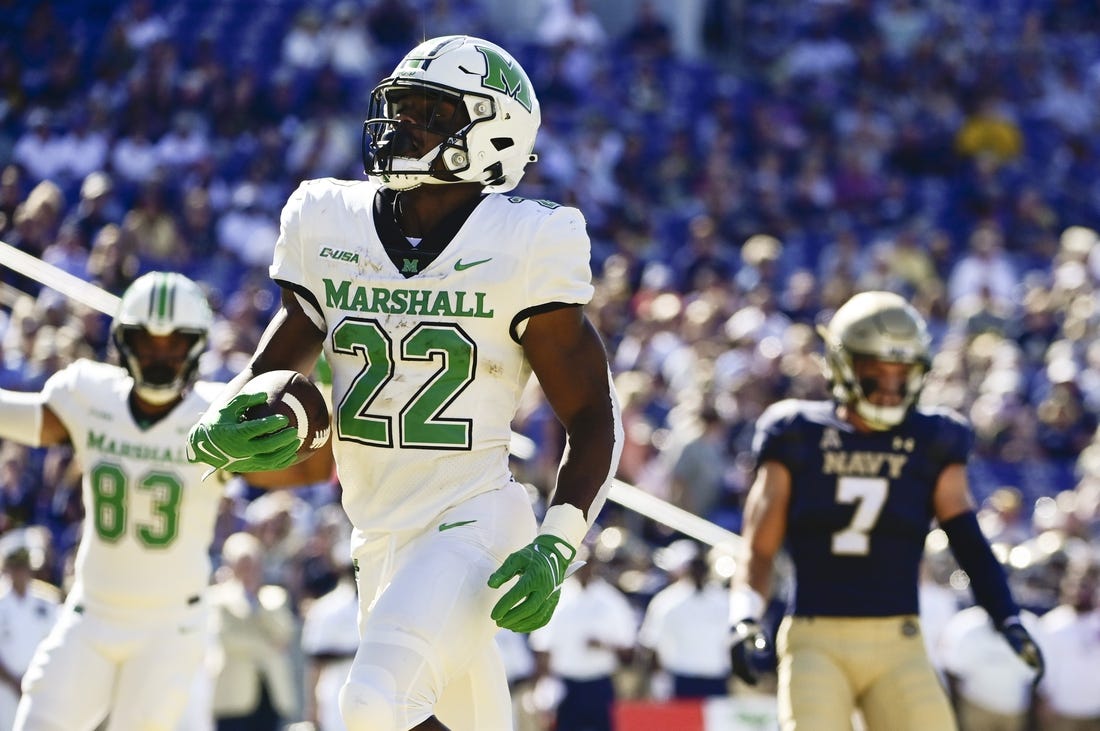 Sep 4, 2021; Annapolis, Maryland, USA;  Marshall Thundering Herd running back Rasheen Ali (22) reacts after scoring a first half touchdown against the Navy Midshipmen at Navy-Marine Corps Memorial Stadium. Mandatory Credit: Tommy Gilligan-USA TODAY Sports