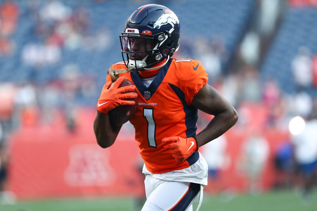 Aug 28, 2021; Denver, Colorado, USA; Denver Broncos wide receiver K.J. Hamler (1) warms up before the game against the Los Angeles Rams at Empower Field at Mile High. Mandatory Credit: C. Morgan Engel-USA TODAY Sports