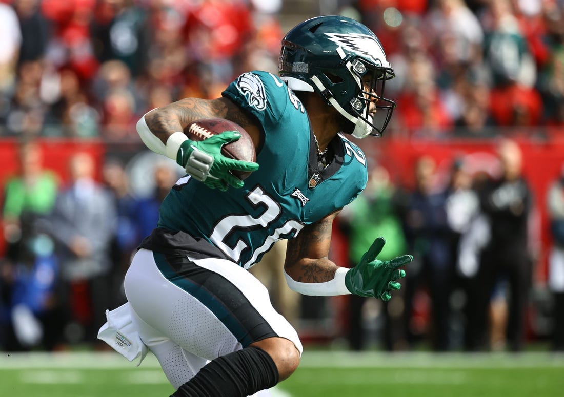 Jan 16, 2022; Tampa, Florida, USA;Philadelphia Eagles running back Miles Sanders (26) runs with the ball against the Tampa Bay Buccaneers during the first quarter in a NFC Wild Card playoff football game at Raymond James Stadium. Mandatory Credit: Kim Klement-USA TODAY Sports
