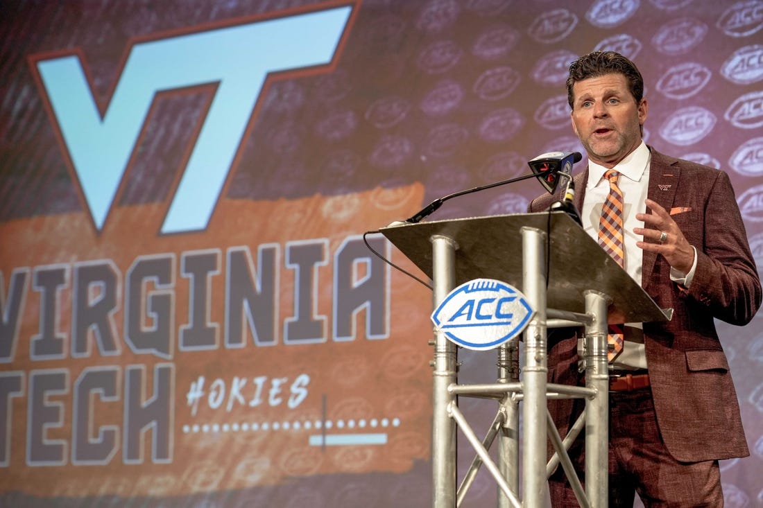 Jul 21, 2022; Charlotte, NC, USA;  Virginia Tech Head Coach Brent Pry talks to the media during the second day of ACC Media Days at the Westin Hotel in Charlotte, NC. Mandatory Credit: Jim Dedmon-USA TODAY Sports