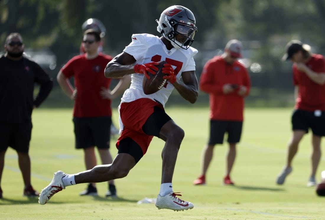 Jul 28, 2022; Tampa, FL, USA; Tampa Bay Buccaneers wide receiver Russell Gage Jr (17) works out during training camp at AdventHealth Training Center. Mandatory Credit: Kim Klement-USA TODAY Sports