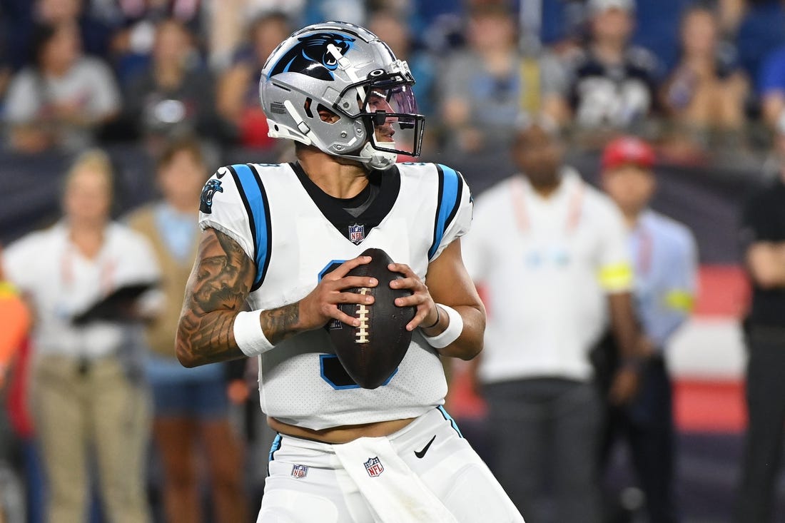 Aug 19, 2022; Foxborough, Massachusetts, USA;Carolina Panthers quarterback Matt Corral (9) drops back to pass during the first half of a preseason game against the New England Patriots at Gillette Stadium. Mandatory Credit: Eric Canha-USA TODAY Sports