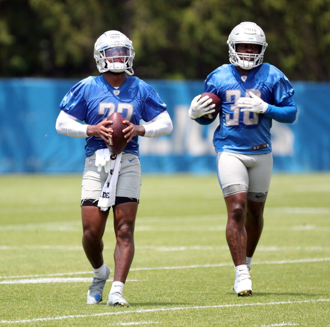 Detroit Lions running backs D'Andre Swift and Jamaal Williams on the field during minicamp practice Wednesday, June 9, 2021, at  then Allen Park practice facility in Detroit.

Lions