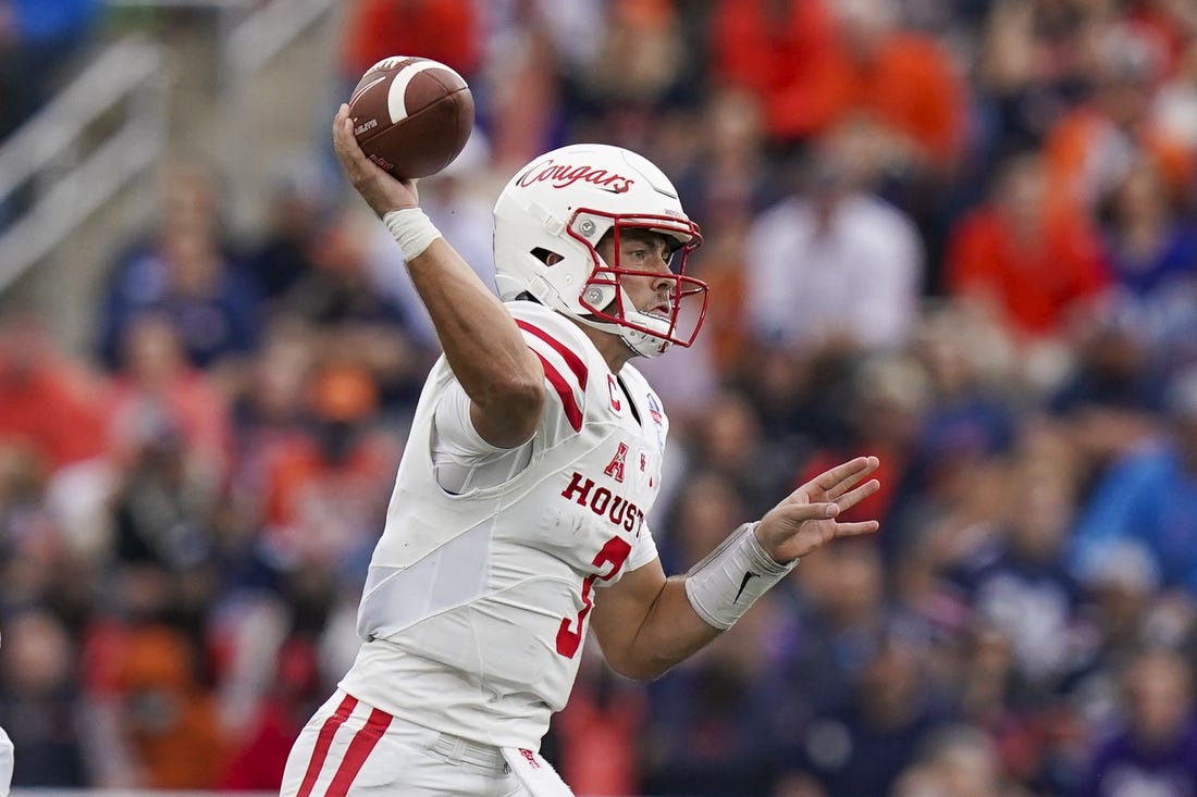 Dec 28, 2021; Birmingham, Alabama, USA; Houston Cougars quarterback Clayton Tune (3) passes against the Auburn Tigers during the second half of the 2021 Birmingham Bowl at Protective Stadium. Mandatory Credit: Marvin Gentry-USA TODAY Sports