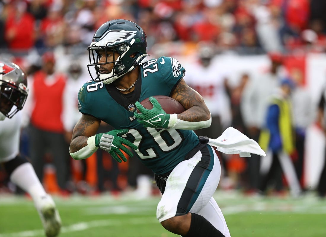 Jan 16, 2022; Tampa, Florida, USA; Philadelphia Eagles running back Miles Sanders (26) runs with the ball against the Tampa Bay Buccaneers during the second half in a NFC Wild Card playoff football game at Raymond James Stadium. Mandatory Credit: Kim Klement-USA TODAY Sports
