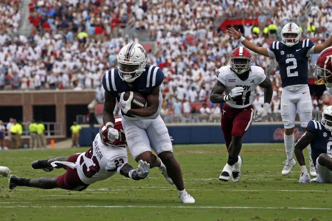 Sep 3, 2022; Oxford, Mississippi, USA; Mississippi Rebels running back Quinshon Judkins (4) runs the ball during the first half against the Troy Trojans at Vaught-Hemingway Stadium. Mandatory Credit: Petre Thomas-USA TODAY Sports