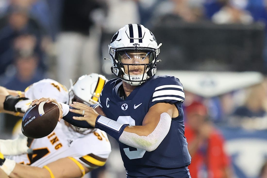 Sep 24, 2022; Provo, Utah, USA; Brigham Young Cougars quarterback Jaren Hall (3) throws the ball against the Wyoming Cowboys in the second quarter at LaVell Edwards Stadium. Mandatory Credit: Rob Gray-USA TODAY Sports