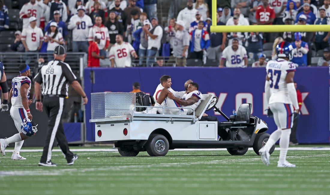 Sep 26, 2022; East Rutherford, New Jersey, USA;  New York Giants wide receiver Sterling Shepard (3) leaves on a cart after injuring himself during the second half against the Dallas Cowboys at MetLife Stadium. Mandatory Credit: Brad Penner-USA TODAY Sports