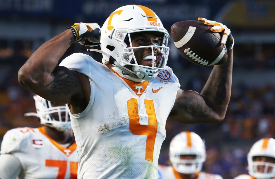 Sep 10, 2022; Pittsburgh, Pennsylvania, USA;  Tennessee Volunteers wide receiver Cedric Tillman (4) reacts after scoring the game winning touchdown against the Pittsburgh Panthers in overtime at Acrisure Stadium.  Tennessee won 34-27 in overtime. Mandatory Credit: Charles LeClaire-USA TODAY Sports