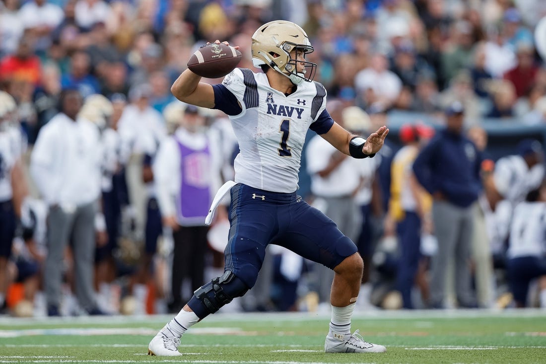 Oct 1, 2022; Colorado Springs, Colorado, USA; Navy Midshipmen quarterback Tai Lavatai (1) looks to pass in the fourth quarter against the Air Force Falcons at Falcon Stadium. Mandatory Credit: Isaiah J. Downing-USA TODAY Sports