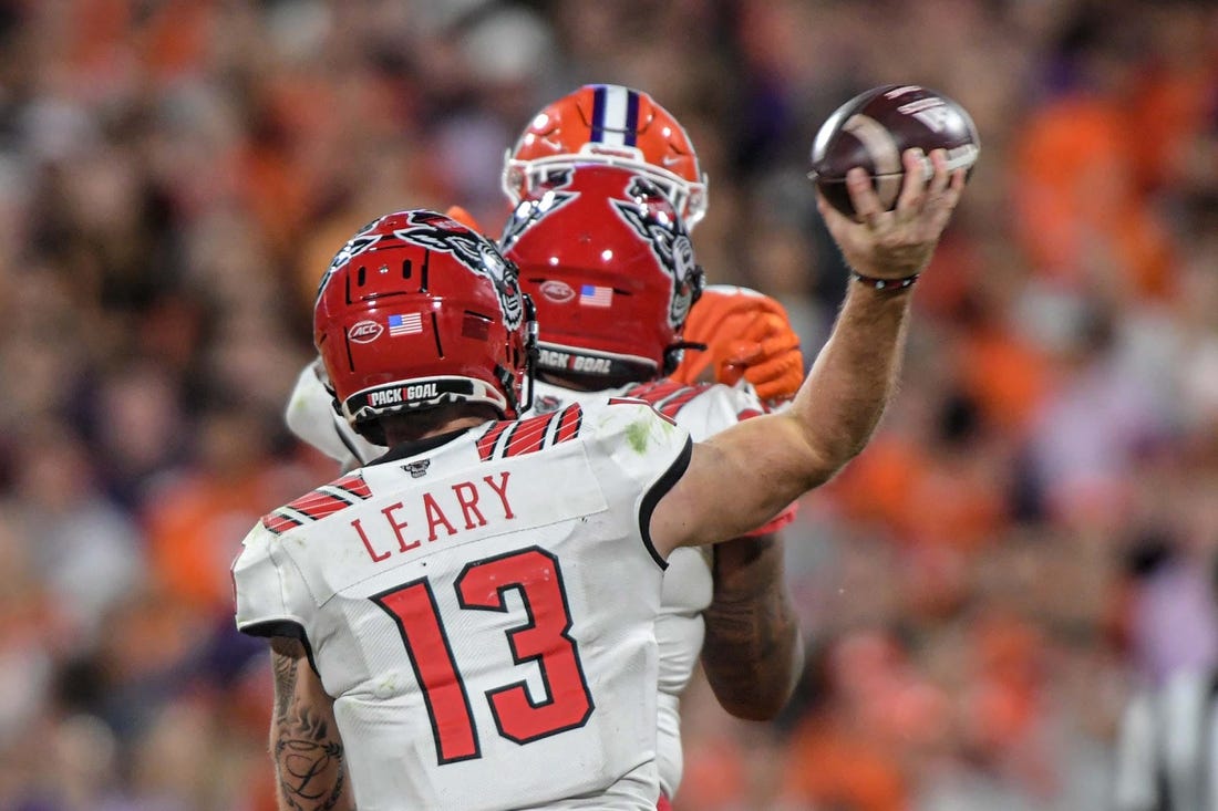 NC State quarterback Devin Leary (13) passes the ball during the fourth quarter at Memorial Stadium in Clemson, South Carolina Saturday, October 1, 2022.

Ncaa Football Clemson Football Vs Nc State Wolfpack