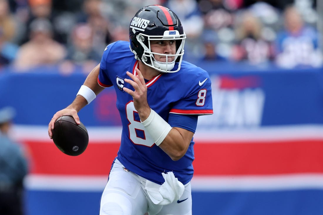 Oct 2, 2022; East Rutherford, New Jersey, USA; New York Giants quarterback Daniel Jones (8) looks to pass against the Chicago Bears during the first quarter at MetLife Stadium. Mandatory Credit: Brad Penner-USA TODAY Sports