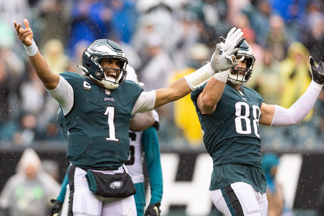 Oct 2, 2022; Philadelphia, Pennsylvania, USA; Philadelphia Eagles quarterback Jalen Hurts (1) and tight end Dallas Goedert (88) react as time winds down on a victory against the Jacksonville Jaguars at Lincoln Financial Field. Mandatory Credit: Bill Streicher-USA TODAY Sports