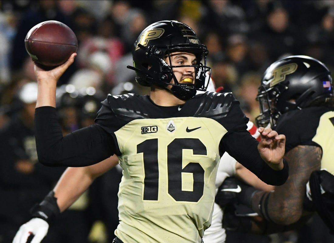 Oct 15, 2022; West Lafayette, Indiana, USA; Purdue Boilermakers quarterback Aidan O'Connell (16) throws a pass during the second half at Ross-Ade Stadium. Mandatory Credit: Robert Goddin-USA TODAY Sports