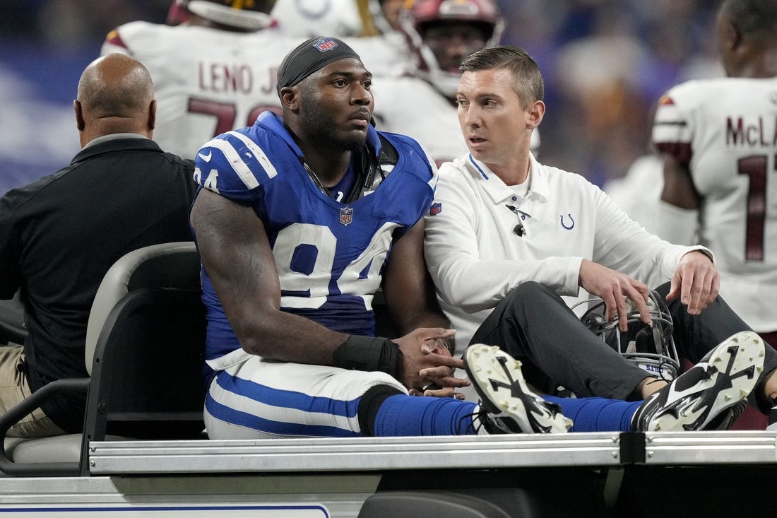 Oct 30, 2022; Indianapolis, Indiana, USA;  Indianapolis Colts defensive tackle Tyquan Lewis (94) is carted off the field following an injury during a game against the Washington Commanders at Indianapolis Colts at Lucas Oil Stadium. Mandatory Credit: Robert Scheer/IndyStar-USA TODAY Sports