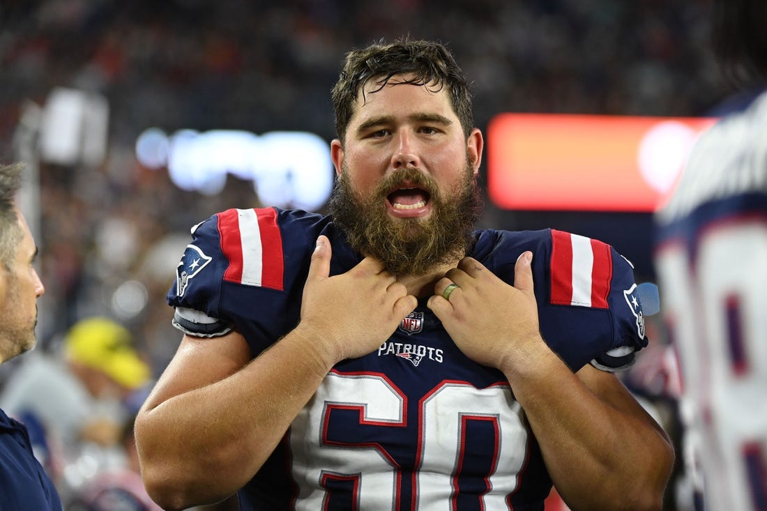 Aug 19, 2022; Foxborough, Massachusetts, USA; New England Patriots center David Andrews (60) on the sideline during the first half of a preseason game against the Carolina Panthers at Gillette Stadium. Mandatory Credit: Eric Canha-USA TODAY Sports