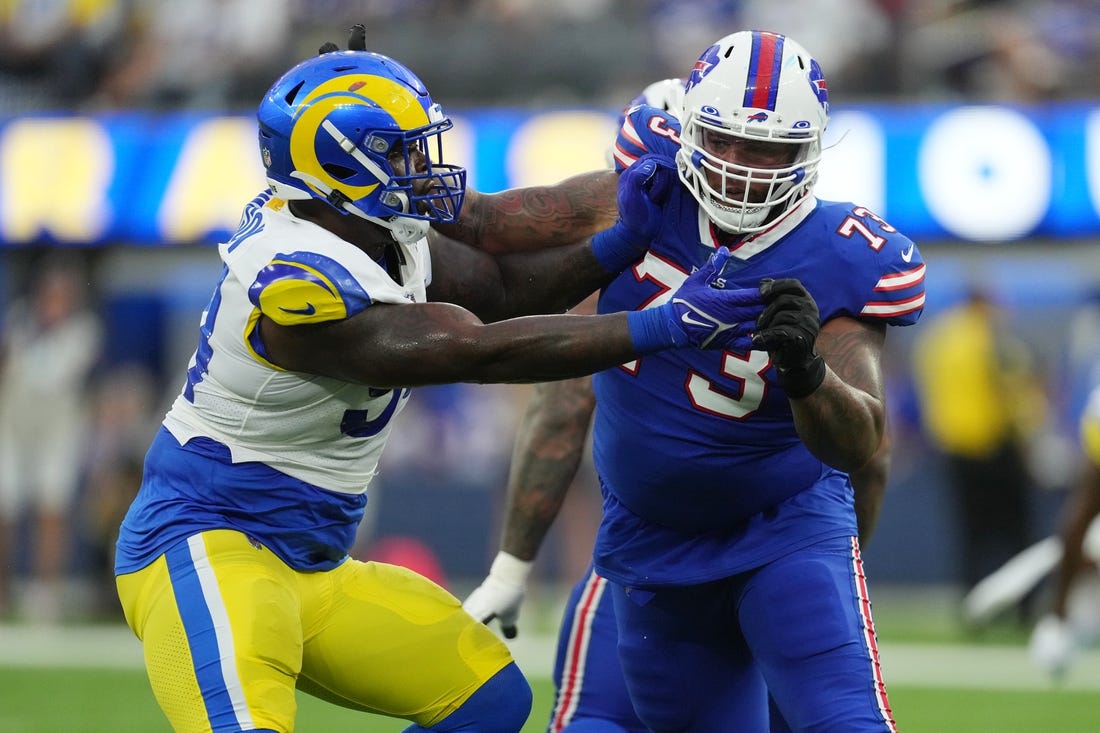Sep 8, 2022; Inglewood, California, USA; Los Angeles Rams linebacker Leonard Floyd (54) defends against  Buffalo Bills offensive tackle Dion Dawkins (73) in the second quarter at SoFi Stadium. Mandatory Credit: Kirby Lee-USA TODAY Sports