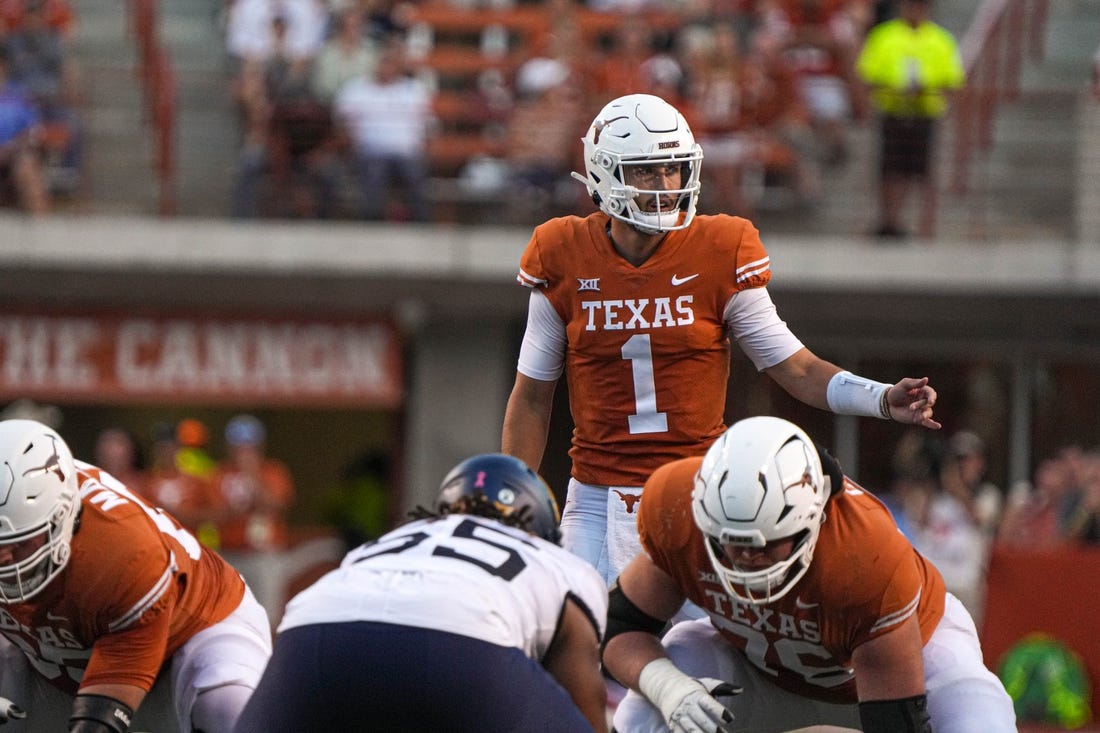 Oct 1, 2022; Austin, Texas, USA; Texas Longhorns quarterback Hudson Card (1) directs the Longhorns offense during a game against the West Virginia Mountaineers at Royal Memorial Stadium. Mandatory Credit: Aaron E. Martinez/American-Statesman via USA TODAY NETWORK