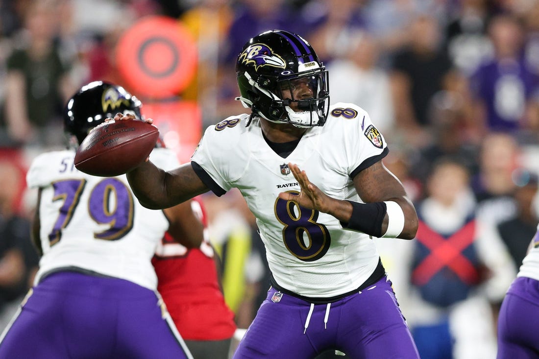 Oct 27, 2022; Tampa, Florida, USA;  Baltimore Ravens quarterback Lamar Jackson (8) drops back to pass against the Tampa Bay Buccaneers in the first quarter at Raymond James Stadium. Mandatory Credit: Nathan Ray Seebeck-USA TODAY Sports
