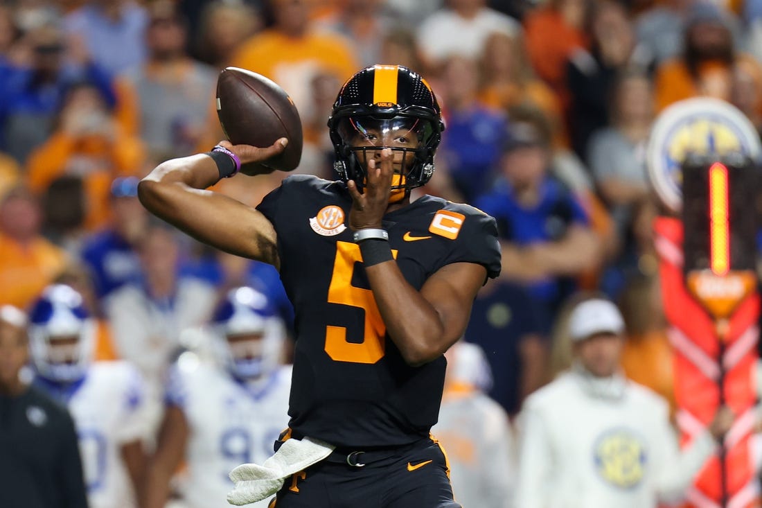 Oct 29, 2022; Knoxville, Tennessee, USA; Tennessee Volunteers quarterback Hendon Hooker (5) passes the ball against the Kentucky Wildcats during the first quarter at Neyland Stadium. Mandatory Credit: Randy Sartin-USA TODAY Sports