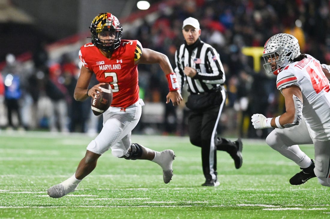 Nov 19, 2022; College Park, Maryland, USA; Maryland Terrapins quarterback Taulia Tagovailoa (3) run by Ohio State Buckeyes defensive end J.T. Tuimoloau (44) during the second half  at SECU Stadium. Mandatory Credit: Tommy Gilligan-USA TODAY Sports