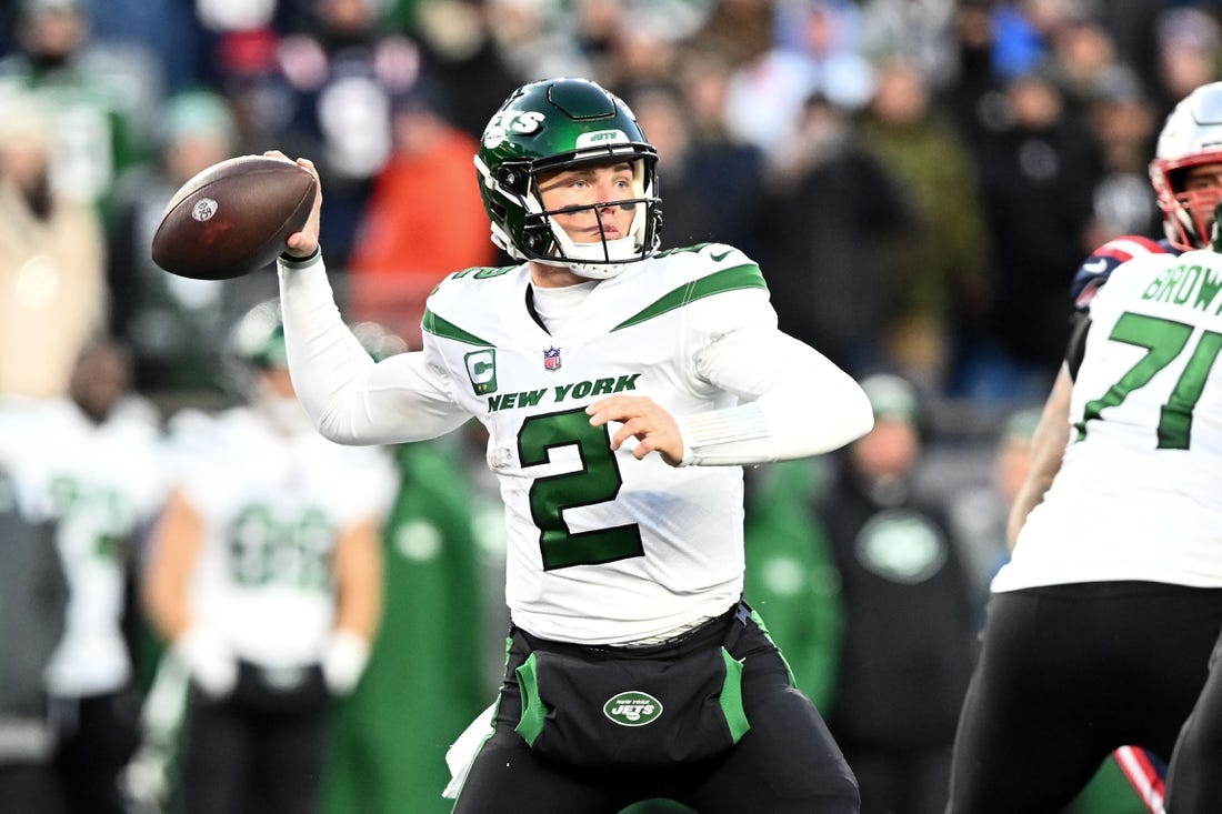 Nov 20, 2022; Foxborough, Massachusetts, USA; New York Jets quarterback Zach Wilson (2) passes the ball against the New England Patriots during the second half at Gillette Stadium. Mandatory Credit: Brian Fluharty-USA TODAY Sports