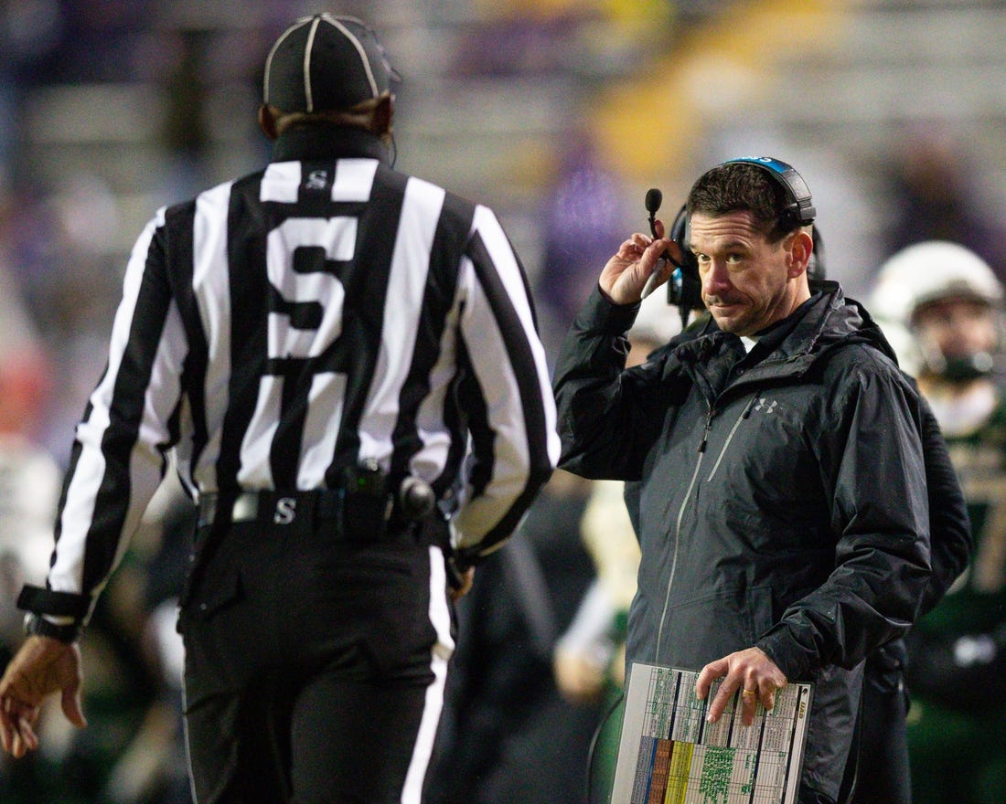 Nov 19, 2022; Baton Rouge, Louisiana, USA;  UAB Blazers interim head coach Bryant Vincent  talks to the side judge against the LSU Tigers during the second half at Tiger Stadium. Mandatory Credit: Stephen Lew-USA TODAY Sports